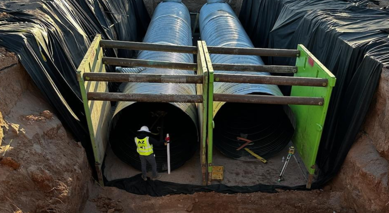 Large storm drain tank installation in excavation